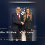 Alix Didier Fils-Aimé serre la main de Kristi Noem dans une salle de réunion à Washington, entourés de leurs délégations respectives.