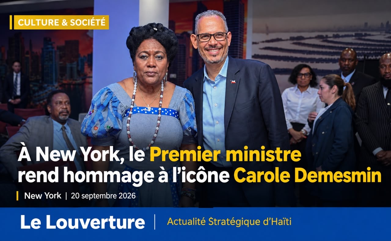 Le Premier ministre Alix Didier Fils-Aimé salue l'artiste Carole Demesmin à New York.